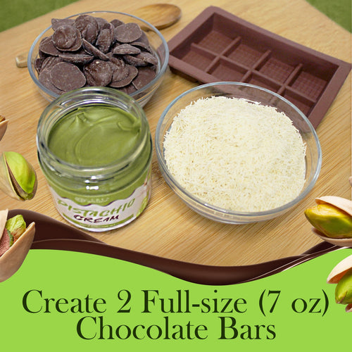 Three bowls with chocolate pieces, shredded white chocolate, and pistachio cream sit beside a mold on a wooden surface, showcasing the Ceres Gourmet Dubai Chocolate Bar DIY Kit for making 2 full-size (7 oz) chocolate bars.