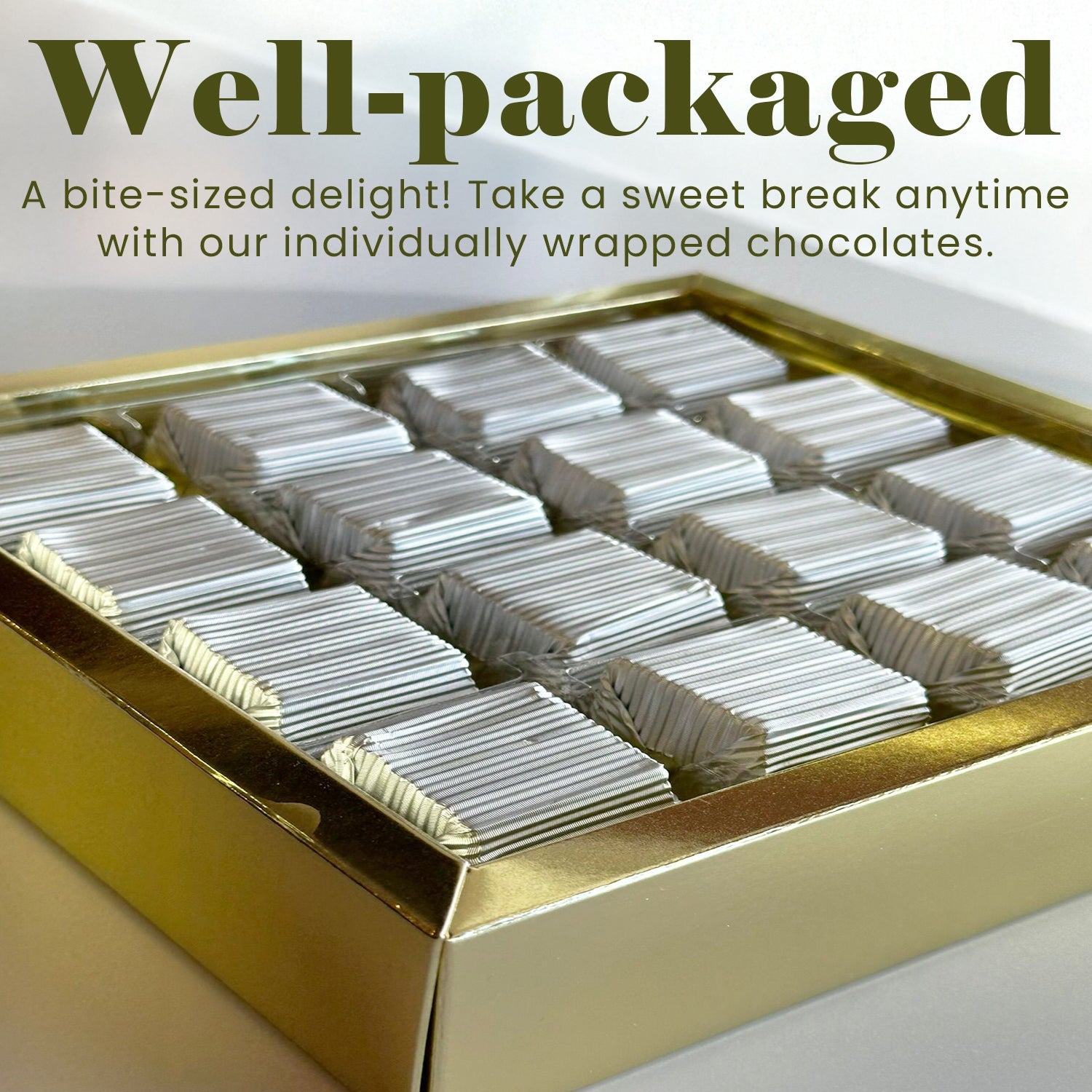 A gold box from Ceres Gourmet holds 16 Dubai Knafah Pistachio Chocolate Bar bite-size treats, each neatly arranged and individually wrapped in silver foil—well-packaged delights perfect for gifting.