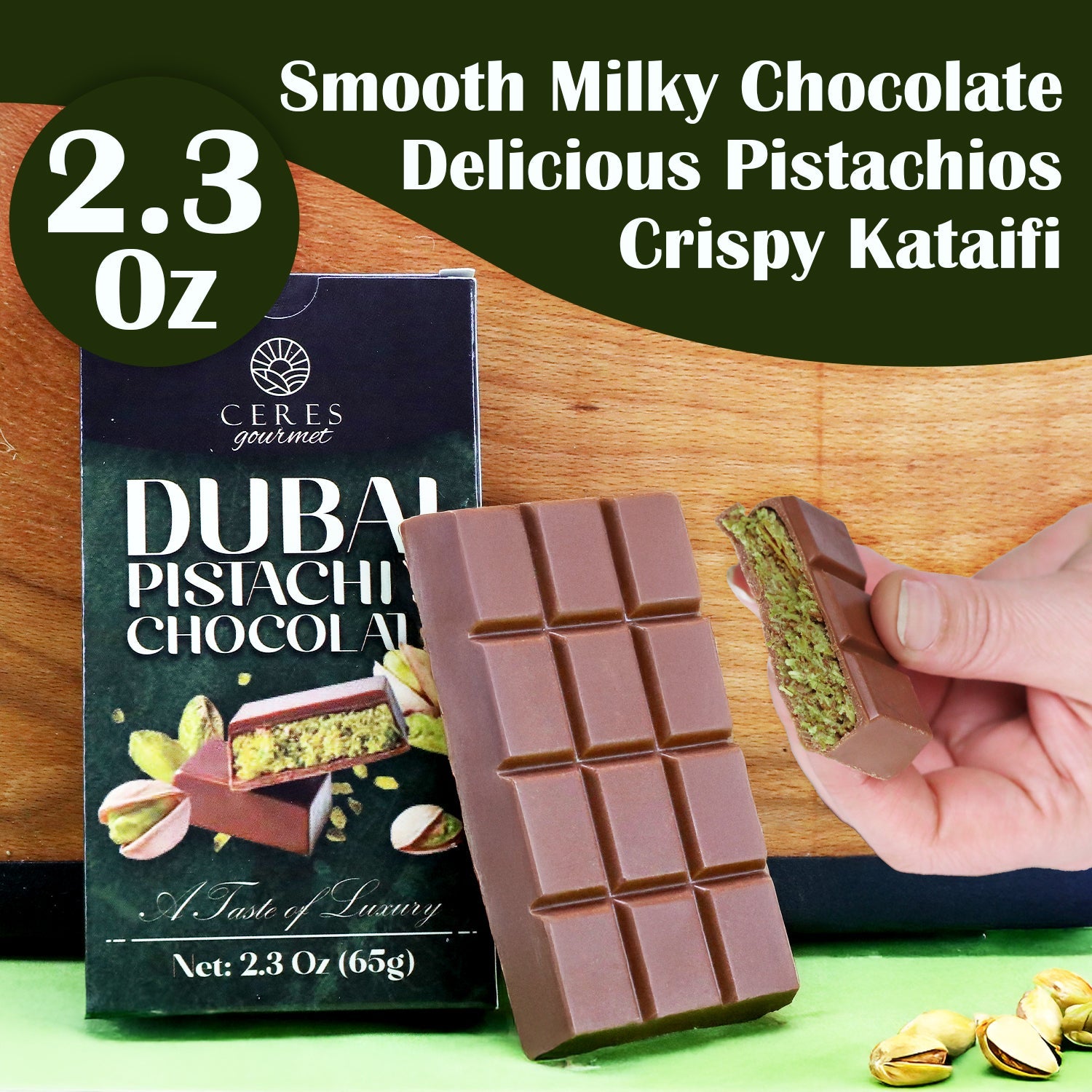 The Ceres Gourmet Dubai Chocolate Pistachio Bar – 2.3oz (65g) is shown with its box, featuring smooth milky chocolate, a green pistachio and crispy kataifi filling for a luxurious treat.