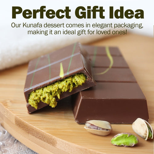 A Ceres Gourmet Dubai Chocolate Bar Pistachio with Milky Chocolate and Knafeh (3.5 oz) sits on a wooden tray, one piece broken to show pistachio filling. Text above says Perfect Gift Idea, highlighting it as an ideal dessert gift.